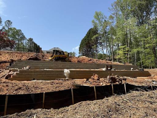 Graded residential lot with silt fencing and drainage in place.